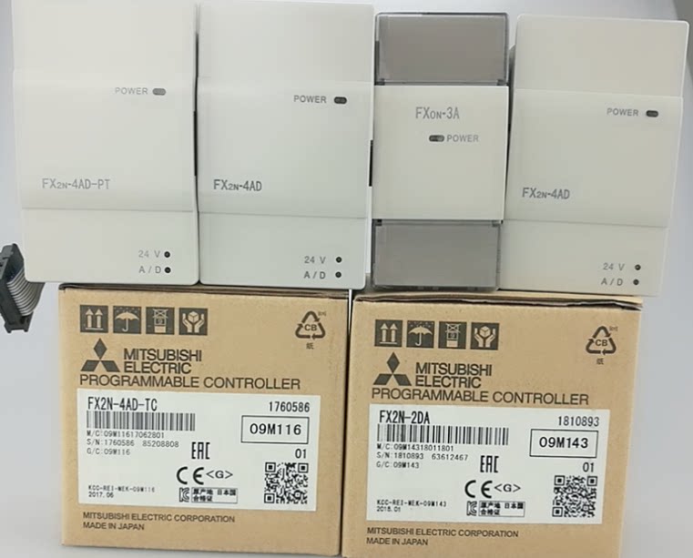 Новый модуль Mitsubishi FX2N-2AD 4AD 8AD 2DA 4DA 5A PT TC 1PG-E 2LC 1HC