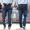 Quần jean nam mùa thu béo cộng với phân bón Quần tây đen XL quần lửng ống thun nam co giãn cao