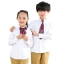 Áo trắng cho bé trai dài tay mùa xuân và mùa thu biểu diễn áo bé gái cổ tròn cotton đồng phục trường tiểu học hoang dã - Áo sơ mi