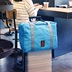 Phiên bản tiếng Hàn của túi du lịch gấp nam và nữ xách tay không thấm nước có thể được đặt xe đẩy trường hợp túi lưu trữ dung lượng lớn túi du lịch xách tay