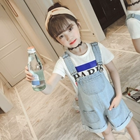 Cô gái denim bib mùa hè ăn mặc 2018 cô gái mới dây đeo quần short Hàn Quốc phiên bản của trẻ em lớn của nước ngoài không khí lỏng phần mỏng chân váy bò bé gái 