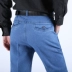 Mùa thu và mùa đông quần jean nam cộng với nhung dày cao eo thẳng kéo dài kích thước lớn kinh doanh cha thường xuyên quần quần quần áo thời trang Cao bồi