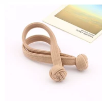 Бежевая длинная резинка