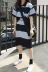Mùa hè mới của Hàn Quốc retro chic thời trang lỏng hoang dã polo cổ áo T-shirt + cao eo dải màu váy phù hợp với áo kiểu nữ đẹp tuổi 35 Bộ đồ