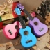 Quà tặng năm mới chất lượng cao cho bé 21 inch nhạc cụ guitar Ukuleli nhạc đồ chơi bằng gỗ nhỏ