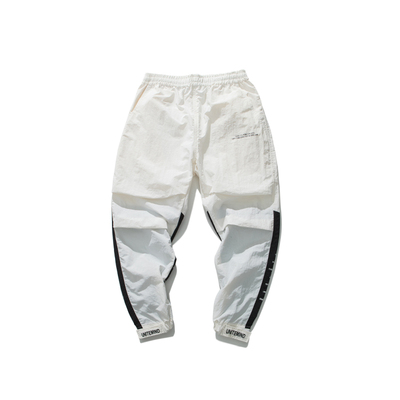 Cứng đầu studio đen và trắng màu sắc tương phản Velcro chữ in feet quần âu thể thao lỏng lẻo chín quần nam quần lửng nam Crop Jeans