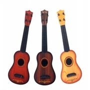 Giấc mơ âm nhạc [guitar mô phỏng có thể chơi] [dây quà tặng] mô phỏng đồ chơi trẻ em ukulele - Đồ chơi nhạc cụ cho trẻ em