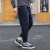 HE Tide thương hiệu mùa thu và mùa đông đơn giản chín quần Nhật Bản quần tây nam giản dị Quần màu vải đa năng Quần trẻ trung Crop Jeans