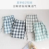 Bộ đồ ngủ của phụ nữ quần short dịch vụ tại nhà kẻ sọc Hàn Quốc cặp vợ chồng mỏng nam cộng với kích thước năm điểm quần short nhà - Quần tây