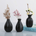 Gốm đen retro nhỏ bình phong cách Nhật hoa khô hoa Zen Zen hoa trang trí bàn bàn trang trí mềm mại - Vase / Bồn hoa & Kệ bình cắm hoa Vase / Bồn hoa & Kệ