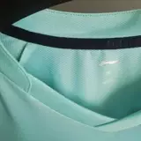 2023 Новый стиль провинциальной команды Ли Нин Тот же настольный теннис тренировочный костюм мужской соревнование для соревнований.