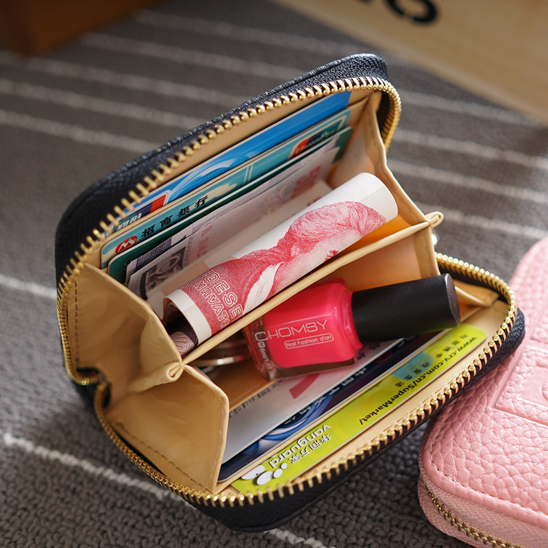 Ms. wallet 2015 new autumn litchi Korean female short section of small purse Men zipper bag Clutch bag pattern