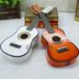 Trẻ em chụp ảnh đạo cụ cung cấp hình ảnh nền đồ chơi phòng thu mô hình guitar mô hình trang trí mới phim nhỏ trang trí cửa sổ - Đồ chơi nhạc cụ cho trẻ em cây đàn đồ chơi cho bé Đồ chơi nhạc cụ cho trẻ em