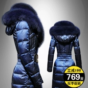 Áo khoác mùa đông nữ dày chính hãng fox fur big tóc cổ áo thời trang chống mùa xuống áo khoác đoạn dài trên đầu gối kích thước lớn