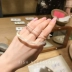 Hàn Quốc Dongdaemun thích hợp vòng tay gió lạnh nữ tối giản sang trọng acrylic đá cẩm thạch retro vòng đeo tay - Vòng đeo tay Cuff