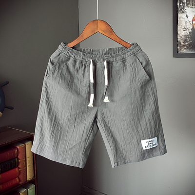 2018 mùa hè mới lanh quần short giản dị của nam giới cộng với chất béo kích thước lớn bãi biển lỏng quần Hàn Quốc phiên bản của xu hướng của quần của nam giới Cực lớn