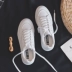 Giày trắng nữ cơ bản hoang dã xuân 2018 nữ mới giày vải sinh viên Phiên bản Hàn Quốc của giày chic giày đế bằng trắng Plimsolls