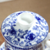 Bộ trà gốm sứ màu xanh và trắng bốn mảnh cốc cốc lọc nước cá nhân cup với nắp lọc họp văn phòng tea cup Trà sứ