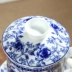 Bộ trà gốm sứ màu xanh và trắng bốn mảnh cốc cốc lọc nước cá nhân cup với nắp lọc họp văn phòng tea cup