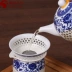 Màu xanh và trắng trà bị rò rỉ trà lọc gốm lọc trà kungfu tea set zero với bộ lọc trà trà trà lọc trà lọc bình pha trà có lưới lọc inox Trà sứ