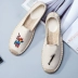 Mùa hè hoang dã rơm thêu hoa ngư dân giày gai phẳng dây giày vải Hàn Quốc phiên bản của một bàn đạp lười biếng giày thường