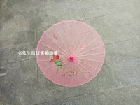 Розовый прозрачный зонт