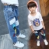 Quần jean bé trai 2017 mùa xuân và mùa thu mới Trẻ em Hàn Quốc mặc quần trẻ em thường xuyên lỏng lẻo quần áo trẻ em giá rẻ Quần jean