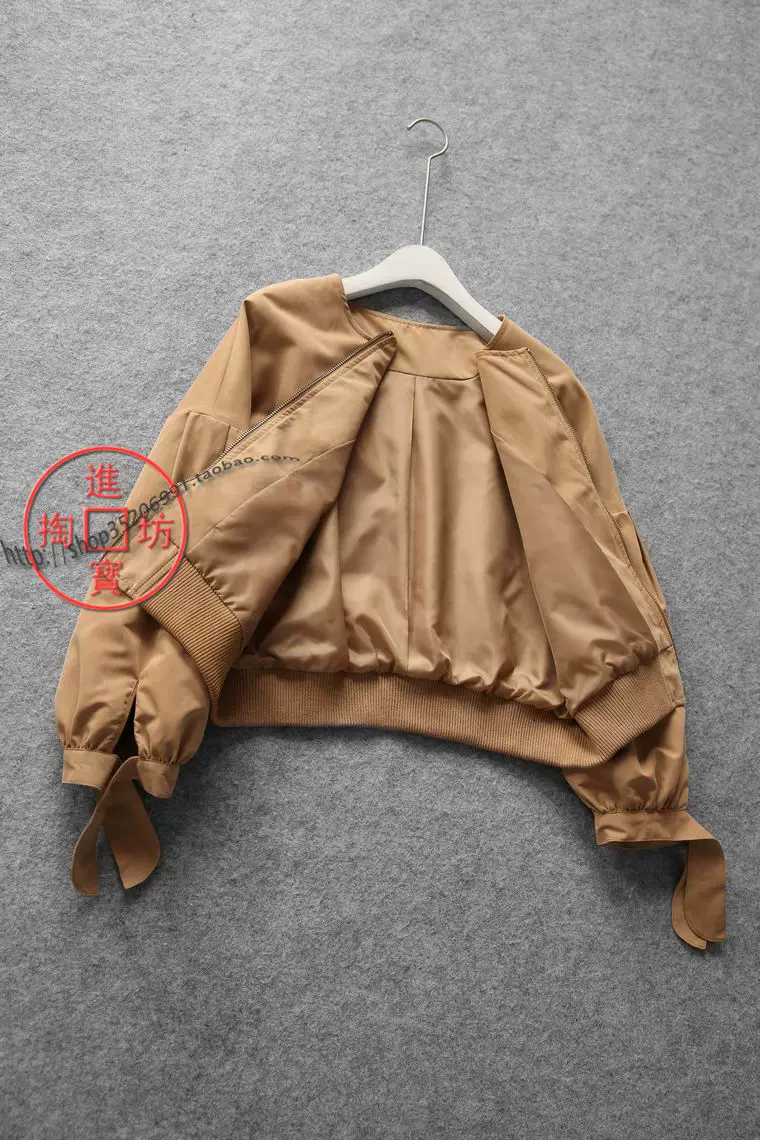 Cropped women's jacket, polyester lined, puff drop-shoulder sleeves with ribbed hem — one size