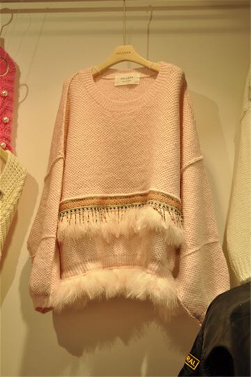 Dongguk door openwork stitching decorative tassels sweet autumn sweater wild female loose sweater coat tide