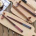Ferris Lane Đũa nhọn kiểu Nhật Bản đũa uốn lượn sáng tạo bằng gỗ rắn cầm tay khách sạn bộ đồ ăn đũa đũa đũa đũa - Đồ ăn tối Đồ ăn tối