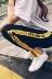 Hồng Kông hương vị Harajuku bf thư dải thể thao quần của phụ nữ quần âu Hàn Quốc phiên bản của lỏng chùm chân hậu cung quần nữ chín quần triều quần nữ thu đông Quần Harem