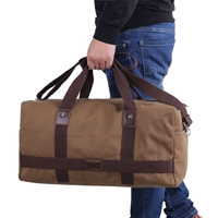 Túi du lịch công suất lớn túi xách nam vải canvas hành lý du lịch gói du lịch khoảng cách ngắn quần áo túi du lịch túi lên máy bay may túi du lịch