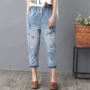 Mùa hè 2019 phiên bản Hàn Quốc của hoa dại thêu chim thun co giãn dây rút bảy chiếc quần jeans nữ - Quần jean quần jean nữ lưng cao