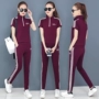 Bộ đồ thể thao Jeffrey Xueyi mùa hè 2019 của phụ nữ có kích thước lớn đứng cổ áo tay ngắn Quần thể thao hai mảnh giản dị - Thể thao sau bộ quần áo the thao thu đông nữ