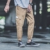 Quần yếm Nhật Bản thương hiệu nam triều Hồng phong cách quần vải rộng thẳng Shawn Yue quần âu nam thanh niên quần dài - Quần Harem Quần Harem
