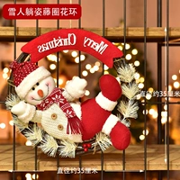 Снеговик лежат в виноградном циркулярном цветочном кольце