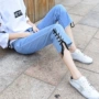 Cá tính dây đeo quần jean nữ sinh viên mùa thu Hàn Quốc phiên bản lỏng mỏng tám quần quần âu cao eo thẳng quần thiết kế thời trang nữ