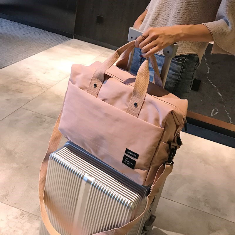Túi du lịch túi xách nữ túi hành lý nhỏ Phiên bản Hàn Quốc đơn giản và nhẹ nhàng, đơn giản và nhẹ nhàng bộ nhỏ tươi túi du lịch - Túi du lịch