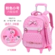 Маленький розовый чемодан на колесиках