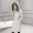 Chống mùa xuống áo khoác của phụ nữ phần dài Hàn Quốc phiên bản của lỏng đầu gối dày ấm màu trắng vịt xuống cổ áo lông thú lớn giải phóng mặt ...