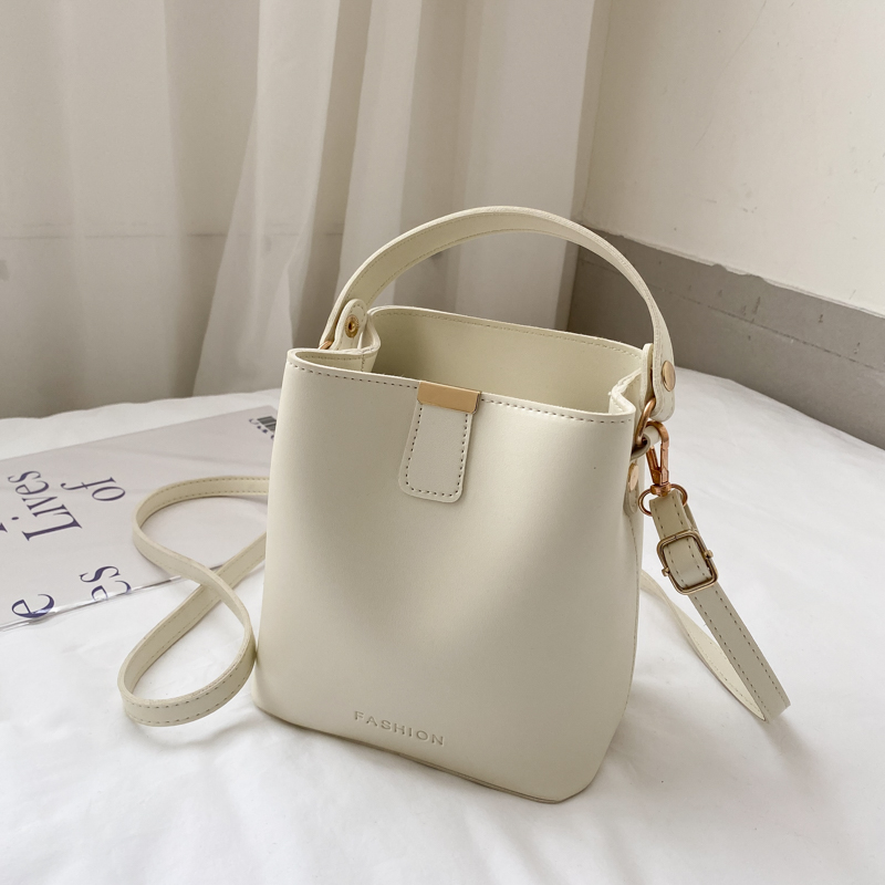 WhiteShangxin popular Internet celebrity Hand bag female 2021 new pattern tide Advanced sense French minority Messenger Foreign style Bucket bag