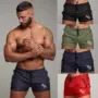 Châu Âu và Hoa Kỳ người đàn ông mới thể thao ba quần thể dục cơ bắp đào tạo quần short thấm hút mồ hôi chạy quần huấn luyện cá nhân - Quần thể thao quần short thể thao nam adidas