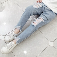 Cô gái lỗ quần jeans phiên bản mùa xuân và mùa thu 2019 mới thủy triều giải trí nước ngoài giải trí lớn quần trẻ em thời trang - Quần jean shop quần áo trẻ em gần đây