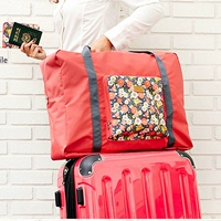 Túi du lịch công suất lớn túi duffel túi du lịch gấp túi du lịch xách tay nữ vải Oxford có thể được kéo túi xe đẩy túi du lịch kéo