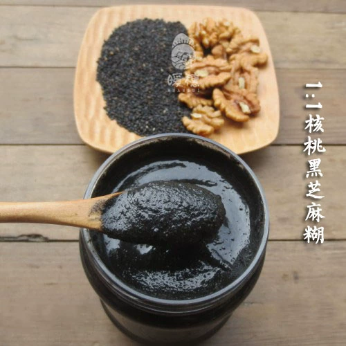 Теплые уши, грецкие орехи, черная кунжутная паста, грецкие орехи и кунжутный соус, чистые питательные грецкие орехи и семена черного кунжута, каждая половина теперь измельчает грубые зерна