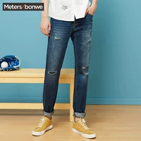Quần jean métbonwe mùa thu nam phiên bản Hàn Quốc của xu hướng quần lỗ chính thức cửa hàng quần học sinh nam - Quần jean quần bò ống rộng nam