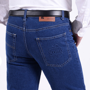 Người đàn ông trẻ của thẳng jeans làm việc quần đầu bò phần dày thợ hàn điện bảo hiểm lao động dụng cụ quần mặc kháng