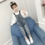 Quần áo trẻ em nữ denim overalls mùa thu 2019 phiên bản mới của Hàn Quốc quần trẻ em nước ngoài rộng rãi cho trẻ em mùa xuân và mùa thu - Quần jean quần jean trẻ em giá rẻ