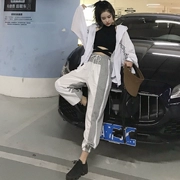 Thời trang phù hợp với nữ đầu mùa thu Hàn Quốc chéo treo cổ vest + lỏng quần áo chống nắng + chùm chân quần âu ba bộ thủy triều