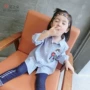 Cô gái dài tay áo 2018 mùa xuân mới Hàn Quốc phiên bản của ve áo trẻ em hoang dã trong chiếc áo sọc dài 0652 áo sơ mi bé gái 10 tuổi